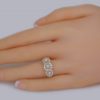 antique engagement ring on finger