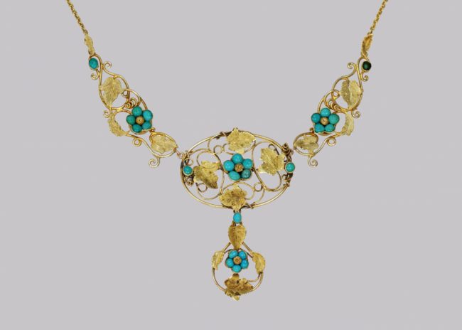 Turquoise necklace with naturalistic vine leaves