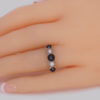 Antique White & Black Pearl Ring on finger