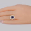 antique sapphire cluster ring on hand