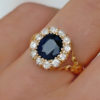 Antique Sapphire Diamond Cluster Ring on Finger