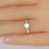 Art Deco diamond ring on finger