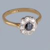 vintage sapphire and diamond engagement cluster ring